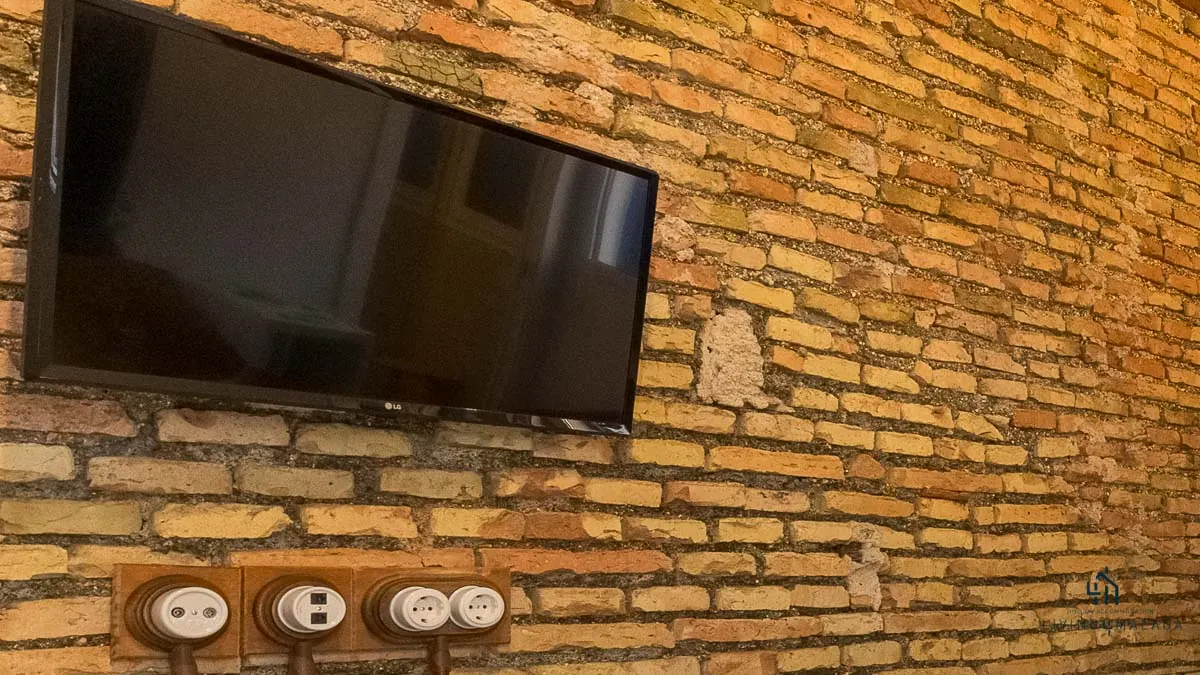 Pared de ladrillo visto en el salón